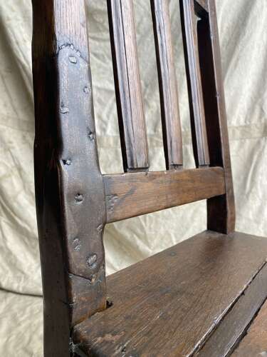 A Georgian primitive Irish oak antique farmhouse chair