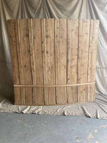 A 19th century antique English pine and oak high barrel back tavern settle