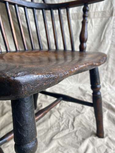 A wonderful early 19th century West Country hoop back antique Windsor chair