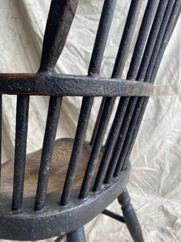 A wonderful early 19th century West Country hoop back antique Windsor chair