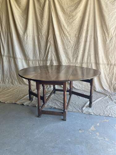 An 18th century antique English oak gateleg table