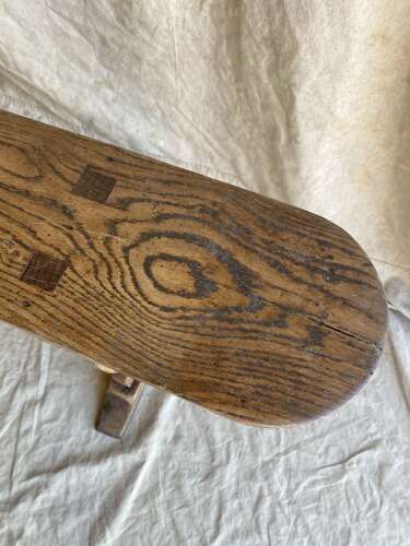 A long early 19th century antique elm bench