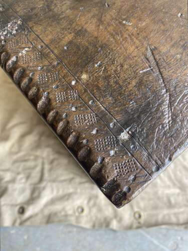 An English antique 17th century six plank oak boarded chest dated 1677