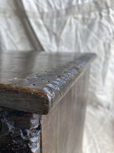 An English antique 17th century six plank oak boarded chest dated 1677