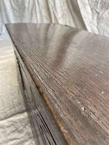 An English antique 17th century six plank oak boarded chest dated 1677