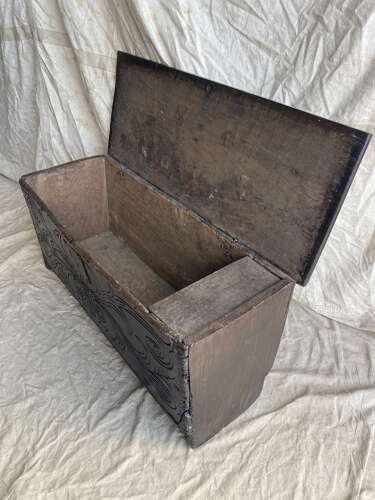 An English antique 17th century six plank oak boarded chest dated 1677