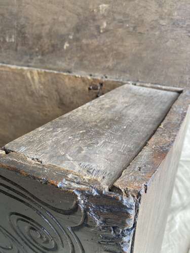 An English antique 17th century six plank oak boarded chest dated 1677