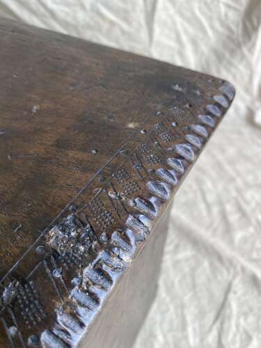 An English antique 17th century six plank oak boarded chest dated 1677