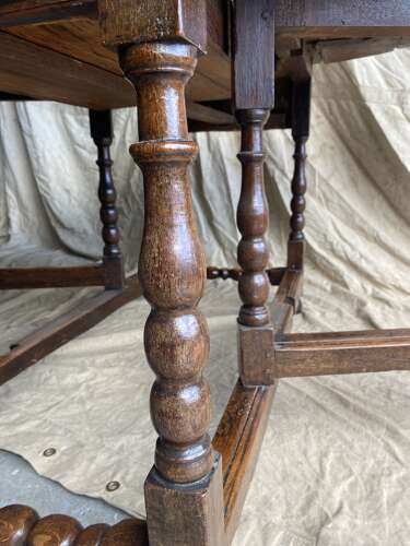 An 18th century antique English oak gateleg table