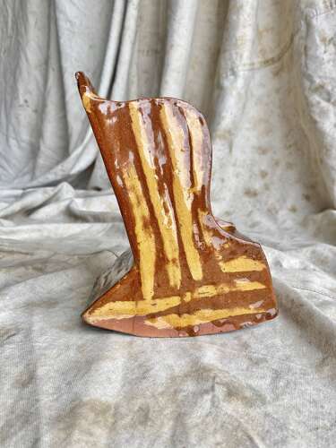 A 19th century antique Yorkshire folk art slipware pottery model of a lambing chair