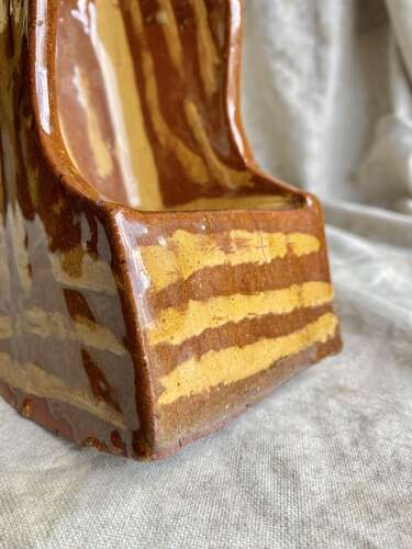 A 19th century antique Yorkshire folk art slipware pottery model of a lambing chair