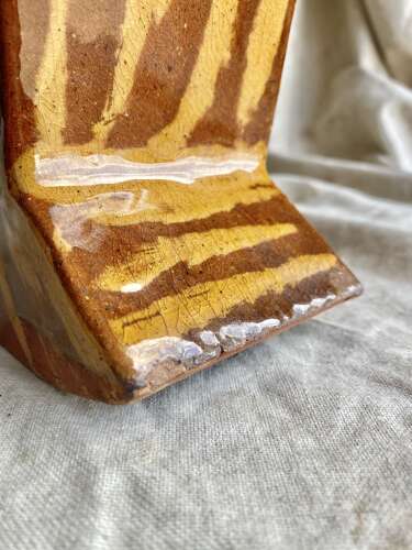 A 19th century antique Yorkshire folk art slipware pottery model of a lambing chair