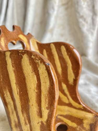 A 19th century antique Yorkshire folk art slipware pottery model of a lambing chair