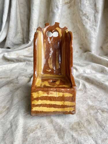 A 19th century antique Yorkshire folk art slipware pottery model of a lambing chair