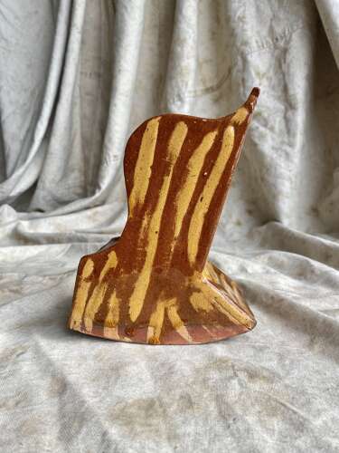 A 19th century antique Yorkshire folk art slipware pottery model of a lambing chair