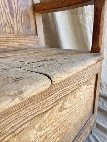 A 19th century antique English pine box settle with storage