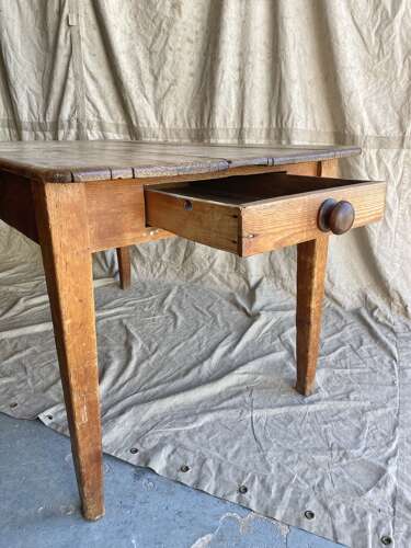 An antique late 19th century pine scrub top kitchen prep table