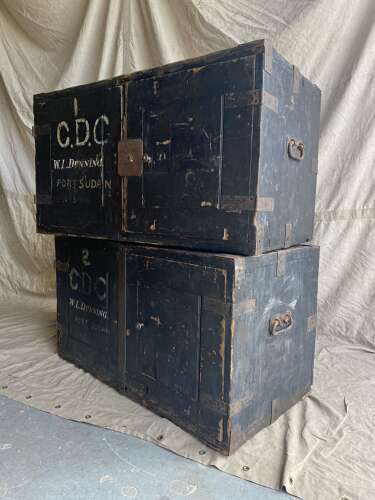 An interesting pair of late 19th century antique pine campaign packing case cupboards