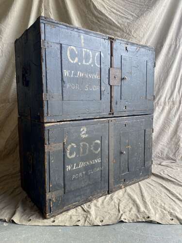 An interesting pair of late 19th century antique pine campaign packing case cupboards
