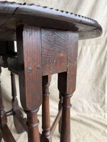 A small antique early 18th century oak gateleg table
