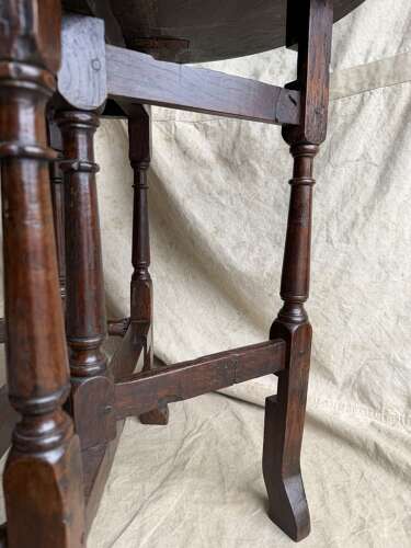 A small antique early 18th century oak gateleg table
