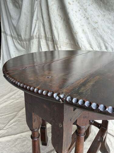 A small antique early 18th century oak gateleg table