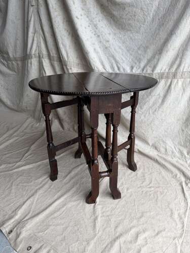 A small antique early 18th century oak gateleg table