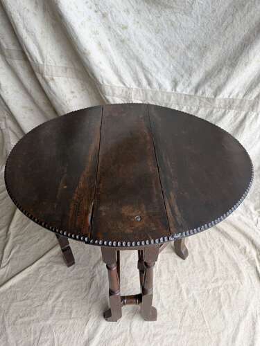 A small antique early 18th century oak gateleg table