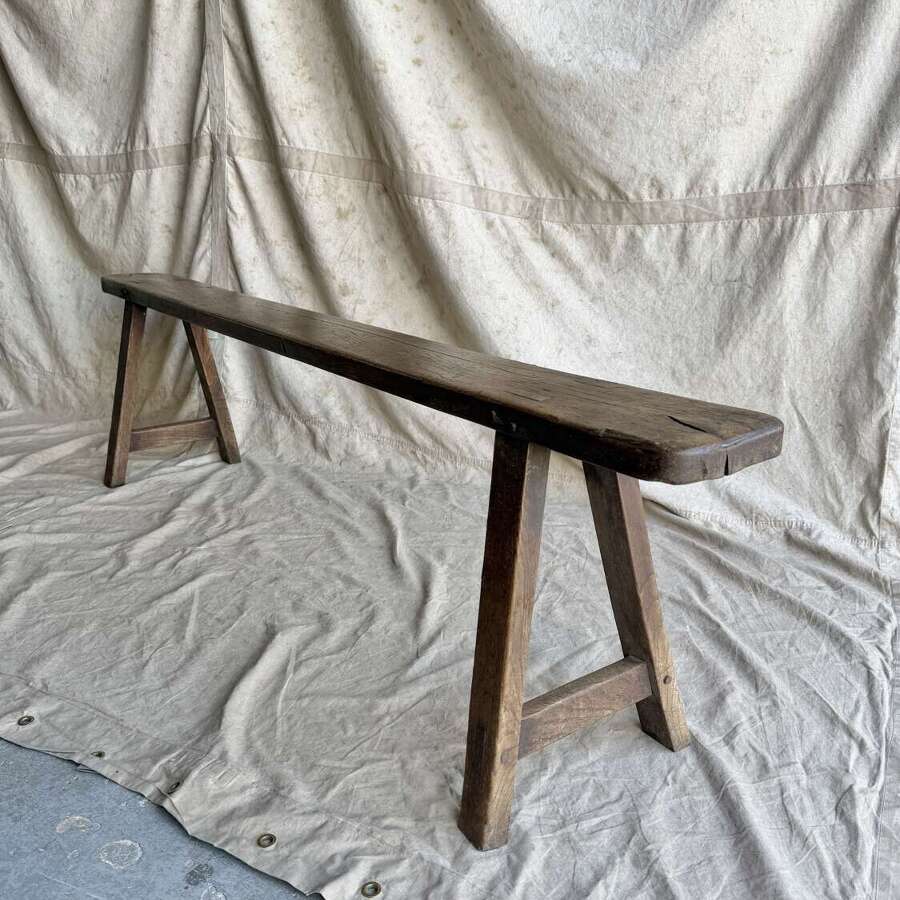 A late 19th century antique French oak six foot long bench