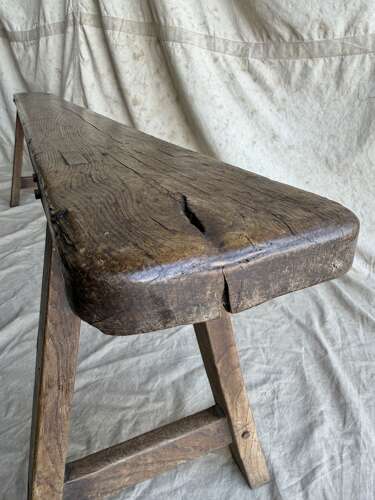 A late 19th century antique French oak six foot long bench