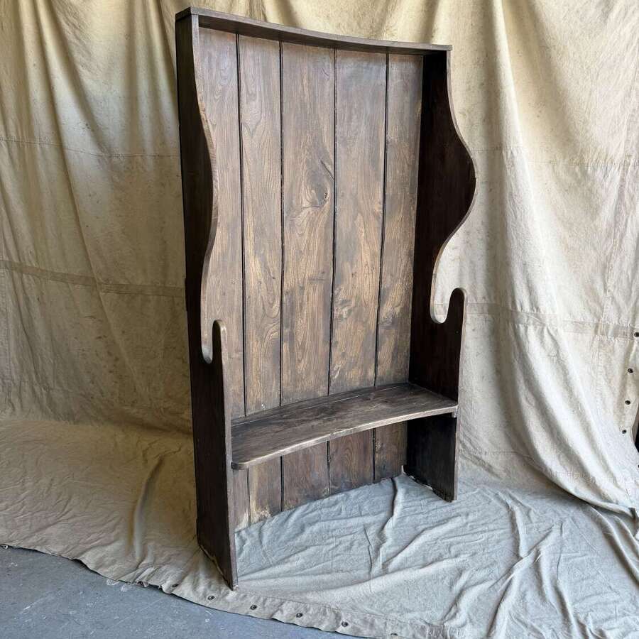 A diminutive 18th century all elm antique barrel back tavern settle