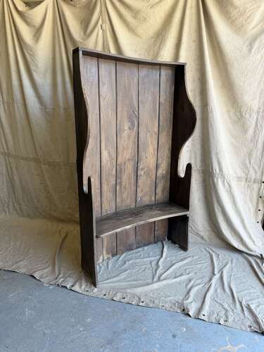 A diminutive 18th century all elm antique barrel back tavern settle
