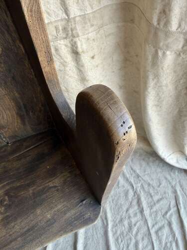 A diminutive 18th century all elm antique barrel back tavern settle