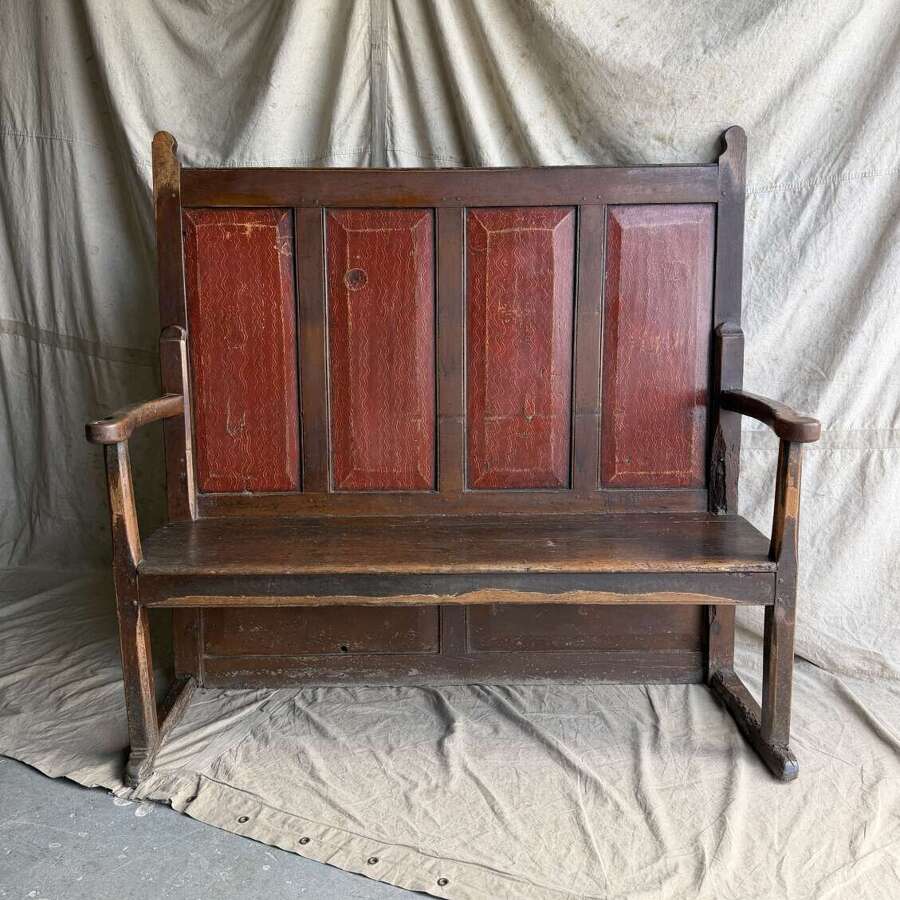 A Georgian Welsh antique elm and pine settle in original painted finish