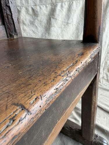 A Georgian Welsh antique elm and pine settle in original painted finish