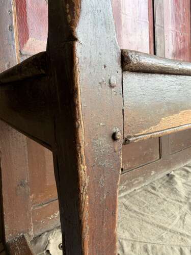A Georgian Welsh antique elm and pine settle in original painted finish