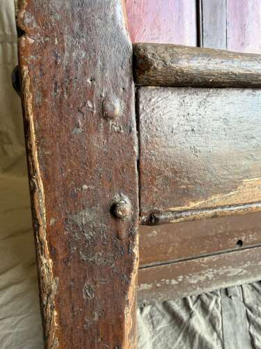A Georgian Welsh antique elm and pine settle in original painted finish