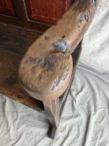 A Georgian Welsh antique elm and pine settle in original painted finish