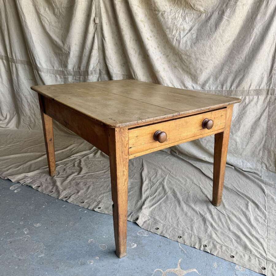An antique late 19th century pine scrub top kitchen prep table