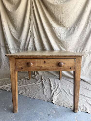 An antique late 19th century pine scrub top kitchen prep table
