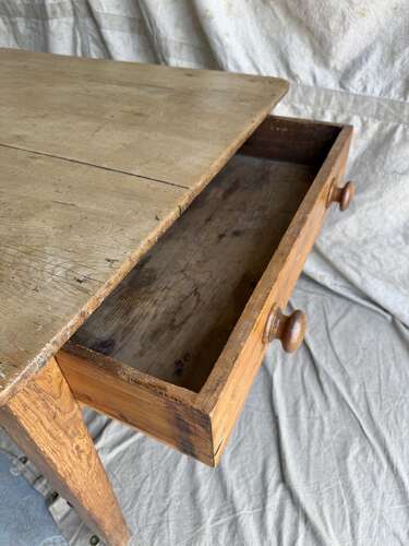 An antique late 19th century pine scrub top kitchen prep table