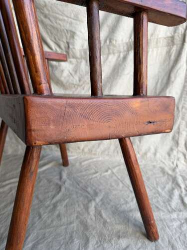 A rustic 1940s Irish vernacular pine famine hedge row chair