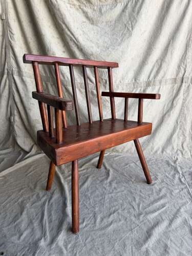A rustic 1940s Irish vernacular pine famine hedge row chair