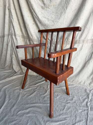 A rustic 1940s Irish vernacular pine famine hedge row chair