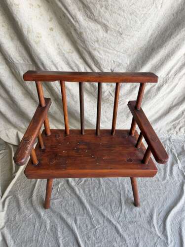 A rustic 1940s Irish vernacular pine famine hedge row chair