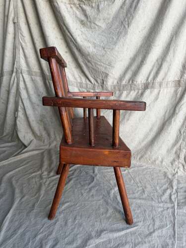 A rustic 1940s Irish vernacular pine famine hedge row chair