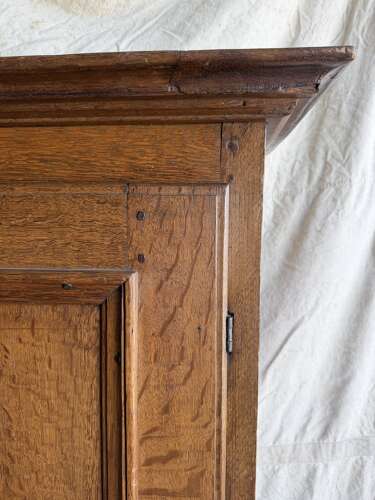 An early 19th century antique oak Porter's chair