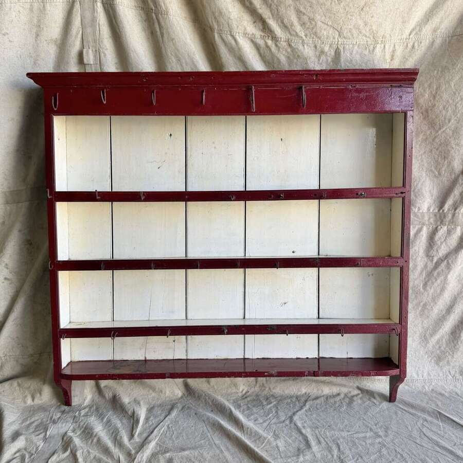 An antique 19th century Welsh painted pine wall hanging plate rack