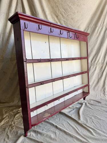 An antique 19th century Welsh painted pine wall hanging plate rack