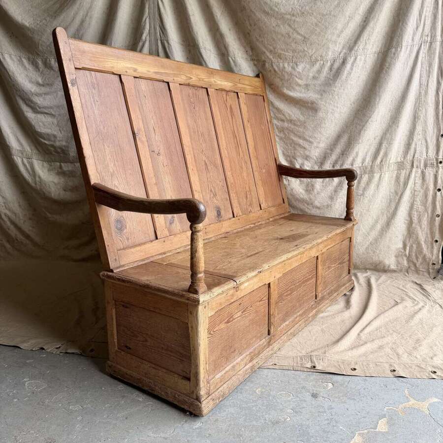 A Welsh antique 19th century pitch pine box settle